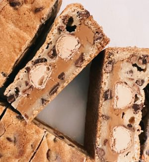 Cookie Butter & Kinder Bar Stuffed Chocolate Chip Bars